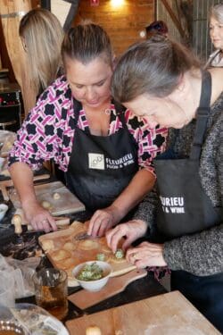 Guests folding pasta on the bench at a Fleurieu Food and Wine pasta class