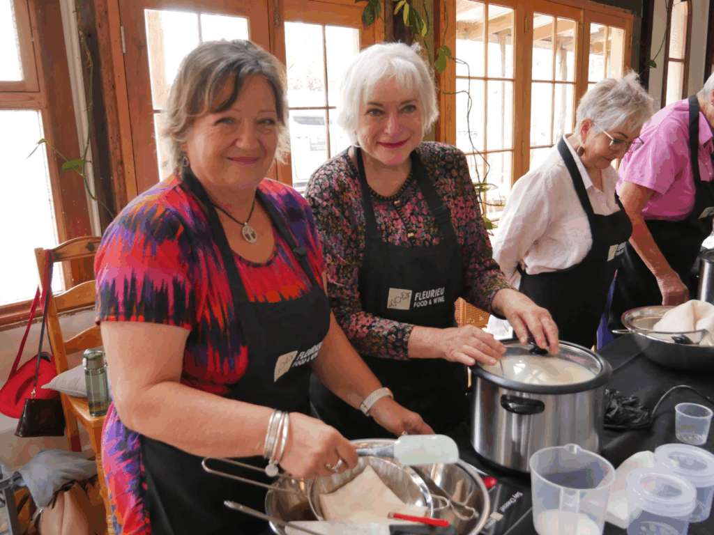 Cheese making smiles with two ladies at a cooking class at Lot 50 Yankalilla