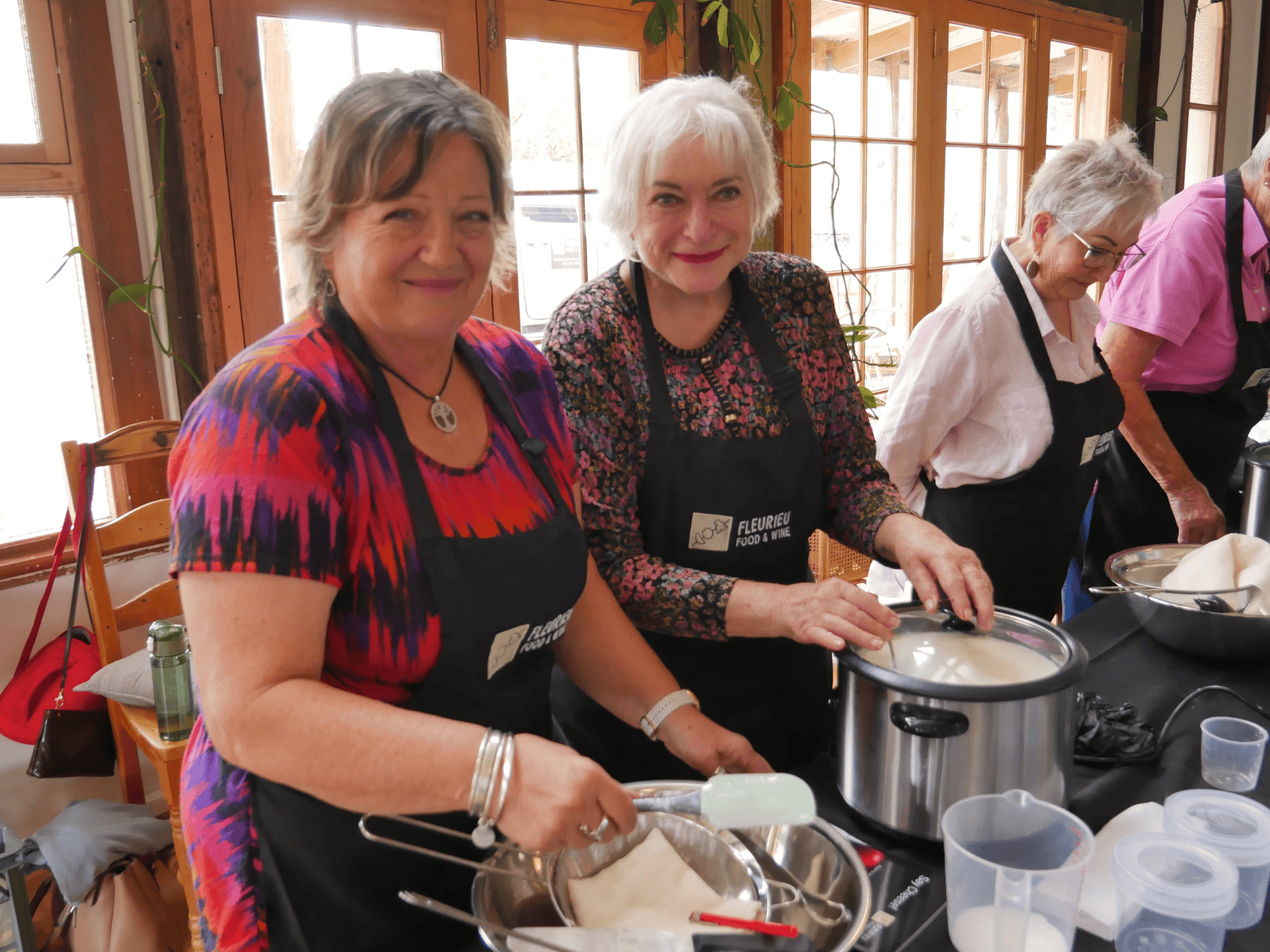Cheese making smiles with two ladies at a cooking class at Lot 50 Yankalilla