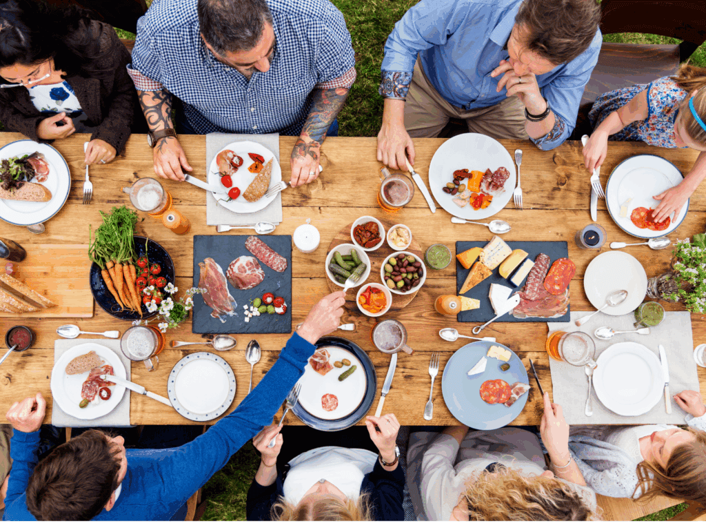 The team and guests around the long table at a Fleurieu Food and Wine cooking class