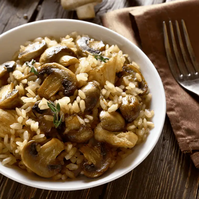 Savory mushroom risotto with fresh herbs and creamy texture, perfect for wine pairings at Fleurieu Food & Wine.