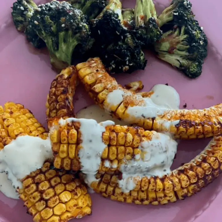 Grilled corn on the cob with creamy herb sauce and charred broccoli, fresh from Fleurieu Food & Wine.