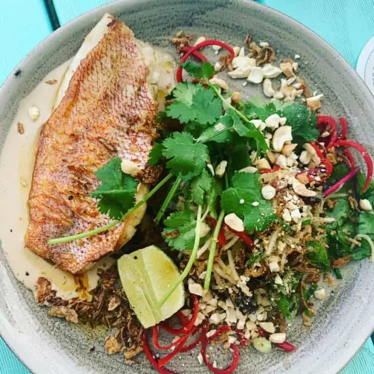 Fresh grilled fish with herb salad and crushed nuts at Fleurieu Food & Wine.