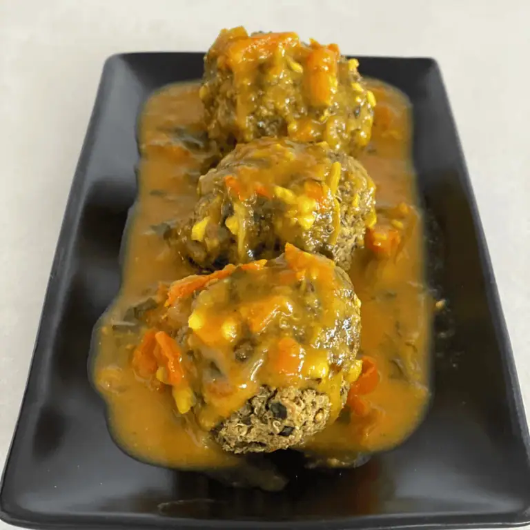 Savory meatballs with vegetable gravy, perfect for Fleurieu Food & Wine pairing.