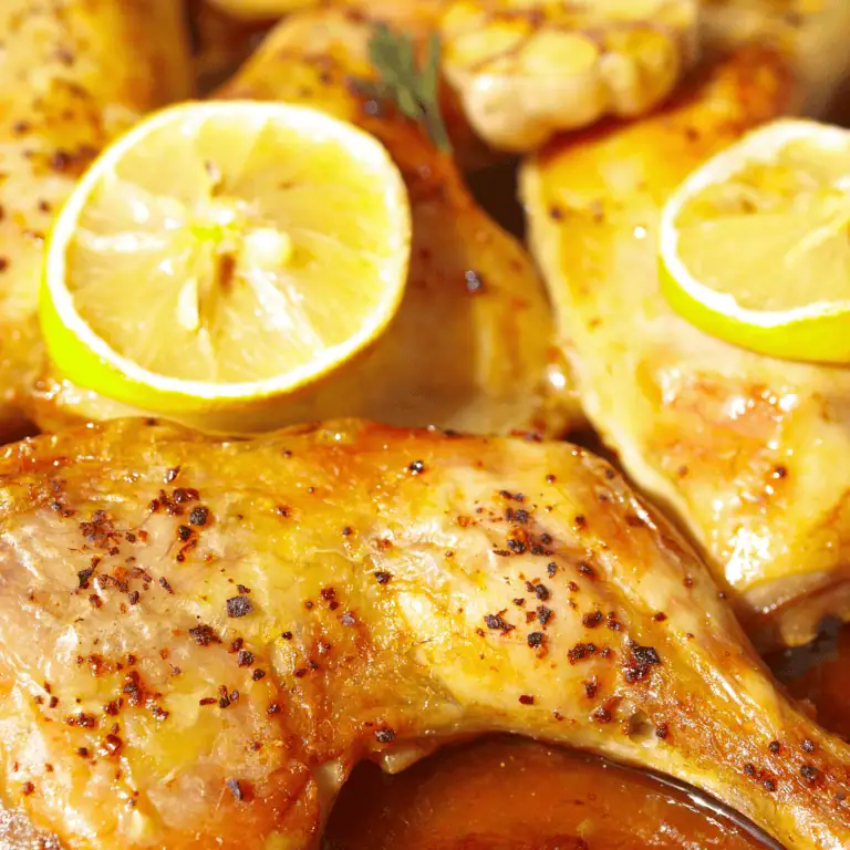Juicy roasted chicken with lemon slices, served as a delicious local food and wine pairing from Fleurieu Food & Wine.