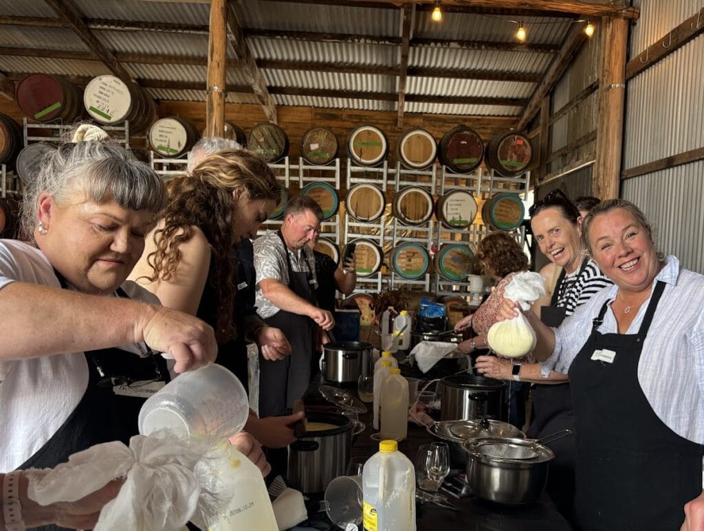 Smiles all around at a cheese making class at Cut Hill Wall Distillery