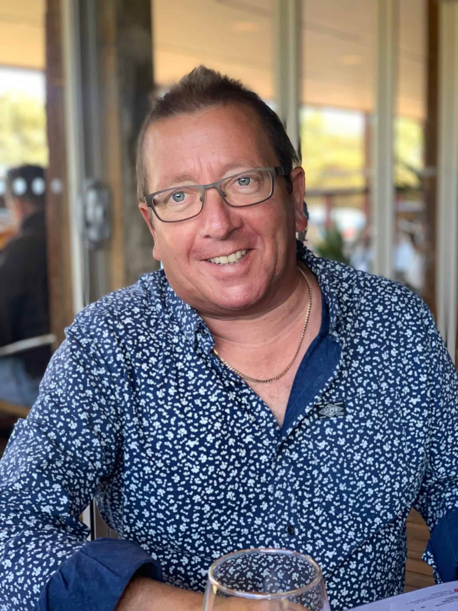 John from Fleurieu Food and Wine pouring wine for guests