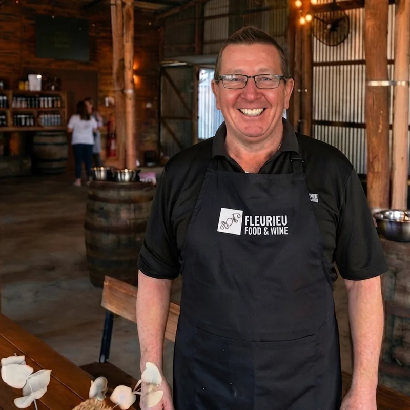 John Mazzocato in a Fleurieu Food and Wine apron at a class venue